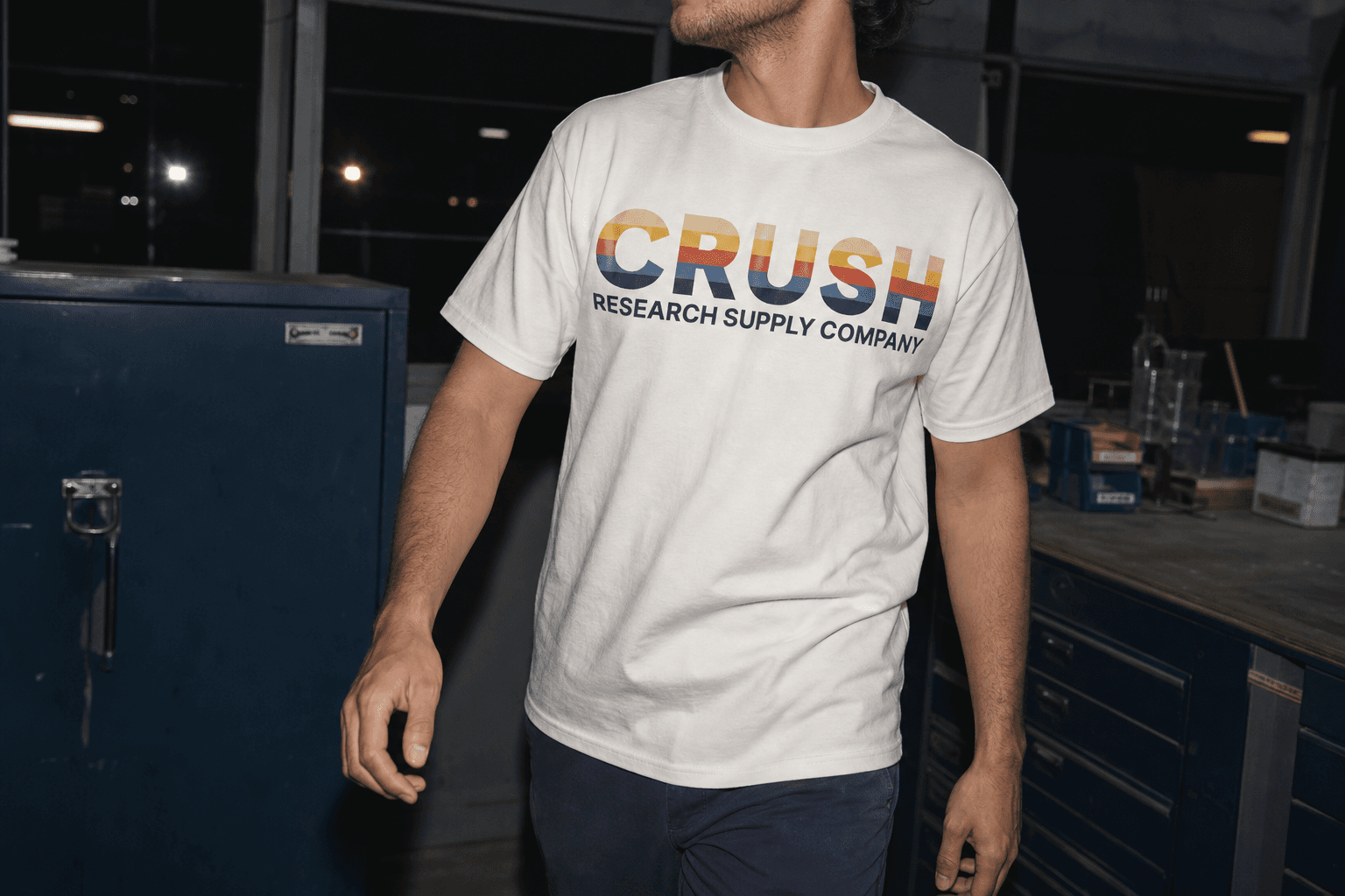 Model wearing a Crush Research Supply Company graphic T-shirt